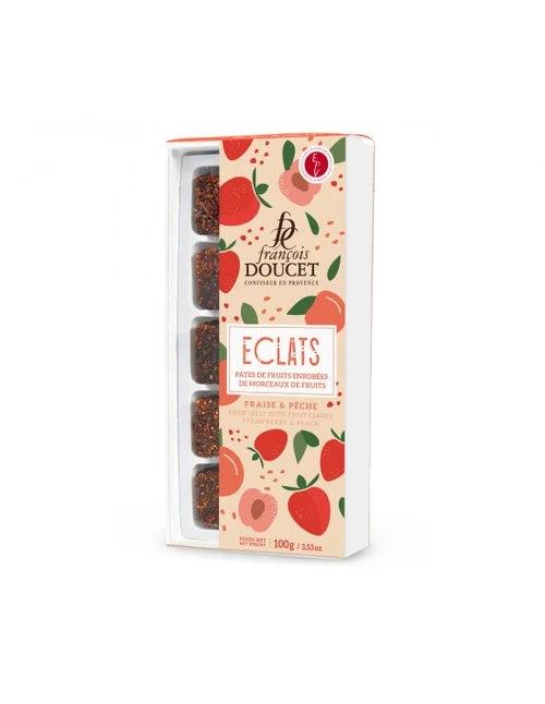 A clear container of 100 grams of François Doucet peach and strawberry pâtes de fruits (fruit jellies) with fruit flakes.