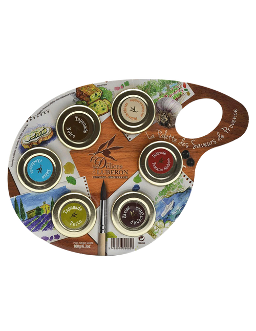 Six jars of Les Délices du Lubéron Provence spreads, totaling 180 grams. The jars are held together by cardboard shaped like a paint palette with watercolor paintings on it.
