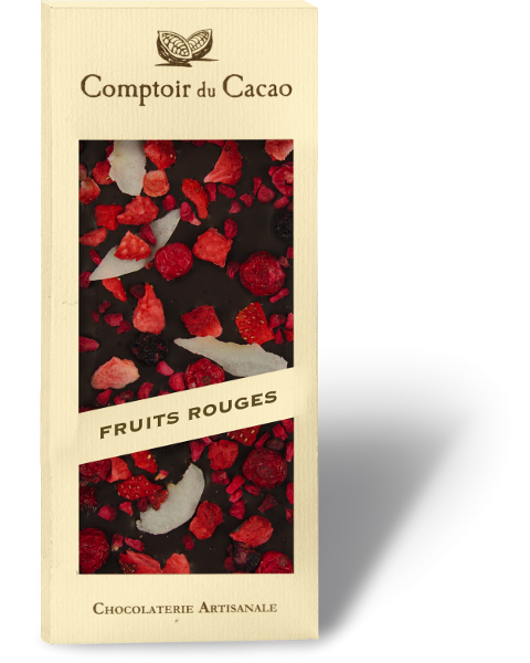 A 100 gram bar of Comptoir du Cacao "Very Gourmand" dark chocolate with berries and coconut. The bar is in a transparent box that displays the chocolate topped with freeze-dried berries and coconut flakes.