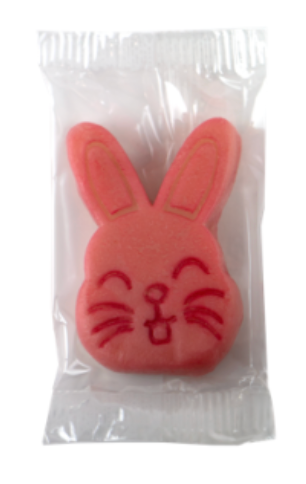 A 26 gram matte pink marzipan cartoon bunny head from Maffren.