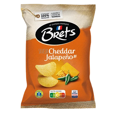 A 125 gram bag of cheddar and jalapeño potato chips, made by Brets from Brittany. The bag has a photo of wavy potato chips next to a piece of cheddar and a few jalapeño peppers.