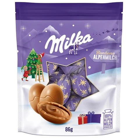 A 86 gram purple bag with a Christmas tree illustration containing individually wrapped milk chocolate Christmas bonbons.