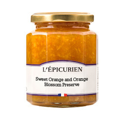 A glass jar containing 320 grams of sweet orange with orange blossom jam from L'Épicurien.