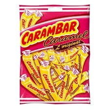 A 130 gram bag of original Camambar candies from La Pie Qui Chante. Each candy is wrapped with yellow wax paper.