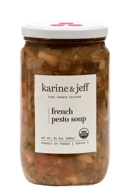 A 720 gram glass jar of organic pistou soup from Karine & Jeff. The chunky soup has visible bean, carrot, and potato chunks.