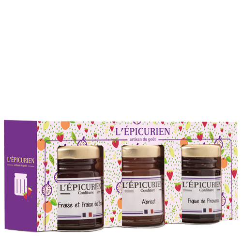 A 150 gram gift set of L'Épicurien's preserves, in mini jars. The three jars contain strawberry and wild strawberry preserves, apricot preserves, and Provence fig preserves, respectively.