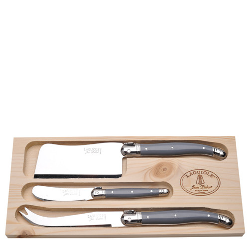 A Laguiole knife cheese set from Jean Dubost. The knife handles are gray and the knives are in the cleaver, spreader, and cheese style.