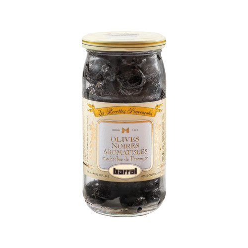 A 230 gram jar of aromatized black olives with Provence herbs, made by Barral. The olives are dry, with no visible liquid in the jar.