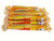 A 128 gram pile of 16 Carambar Caranougat candy sticks, individually wrapped with wax paper. Made by La Pie Qui Chante.