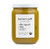 A 50 centiliter glass jar of silky squash soup with mushroom & tarragon from Karine & Jeff. The yellow soup has speckles but otherwise appears smooth.