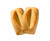 A pair of orange blossom navettes from Biscuiterie de Provence. The golden navettes are rectangular with a notch in the center.