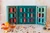 An open segment of the advent calendar, showcasing the 24 boxes of tea sachets.