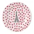 A dessert plate illustrated with the Eiffel Tower surrounded by many small red hearts.