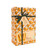 Biscuiterie de Provence's organic orange blossom navettes in a 100 gram gift box. The box is printed with a sepia-tinged illustration of oranges and an image of a black ribbon.