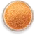 A top down view of brown cane sugar in a bowl.