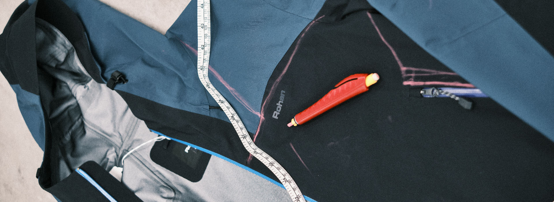 Jacket with chalk pen markings and tape measure