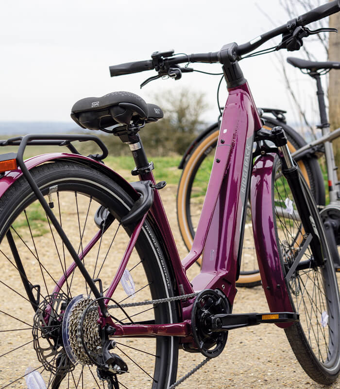 A close up view of an e-bike on it's foot stand