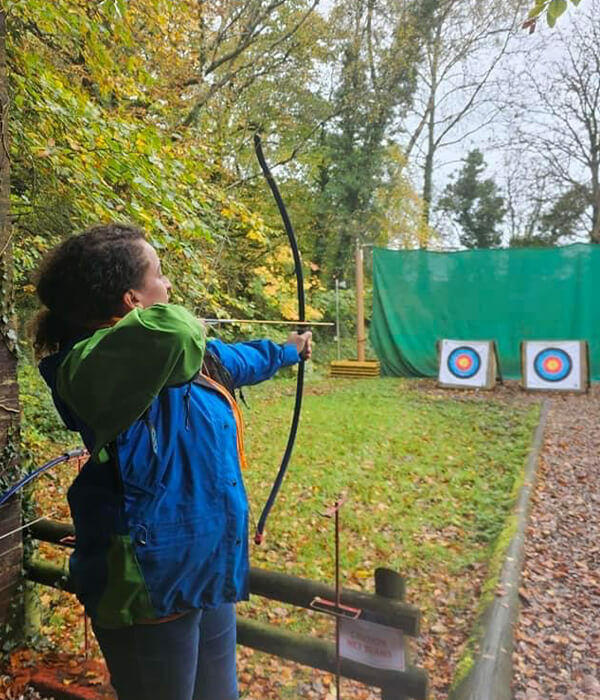 Participant of 1st Wythenshawe Scout Group playing archery