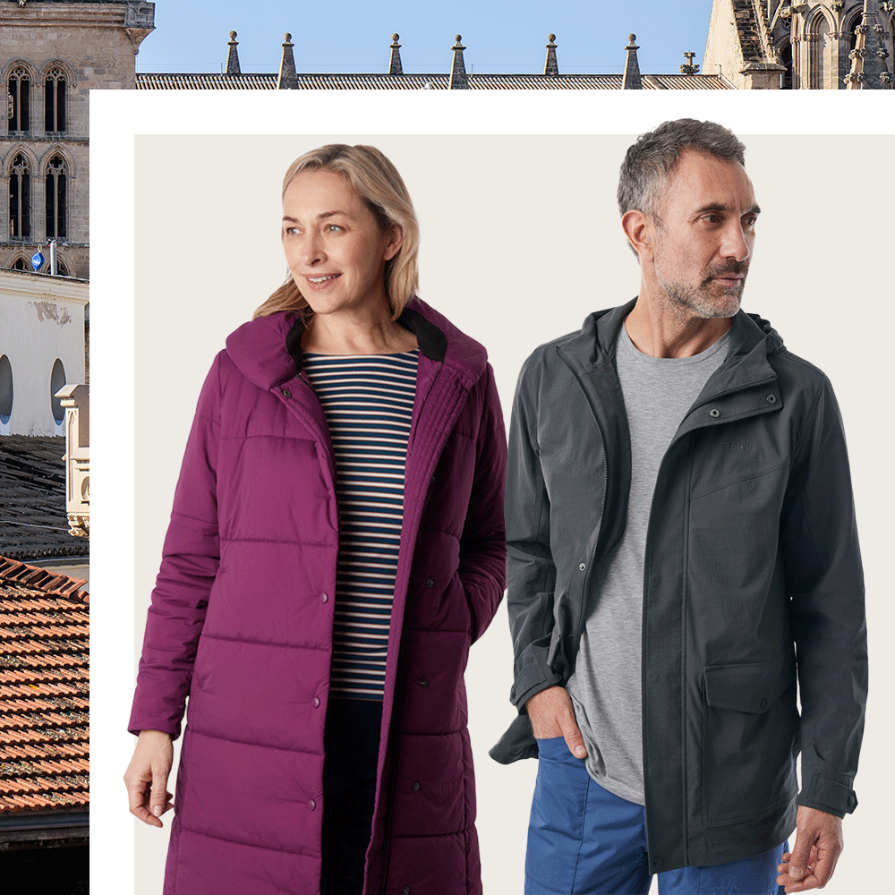 Rohan City Travel Clothing Outer Layers; woman wearing Alvei long coat and man wearing Valley Jacket