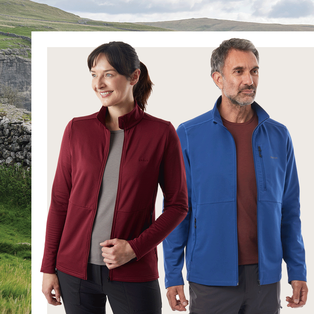 Rohan Walking Clothing Mid Layers; woman wearing Gridline Fleece and man wearing Vale Fleece Jacket