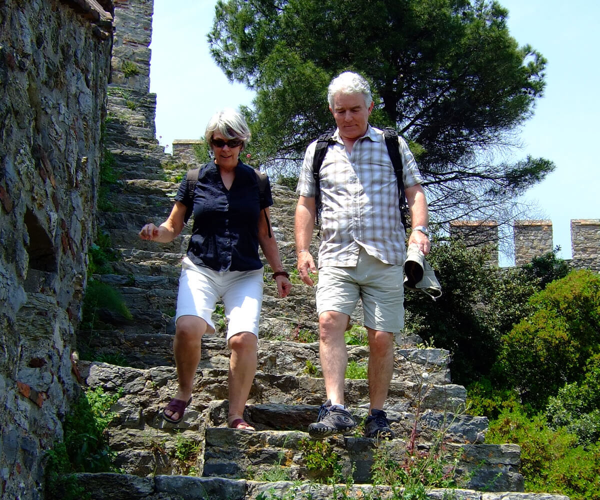 Liz and man in Rumeli Hisa Istanbul, walking down monument steps.