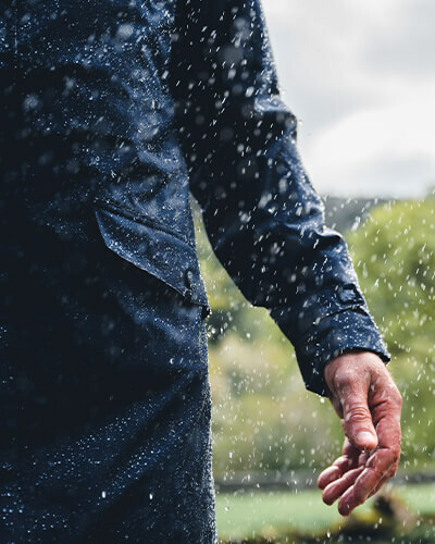 Close up of Rohan Waterproof jacket in the rain