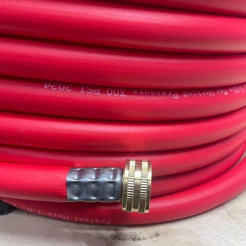 ProTool Ultra Light Hybrid Hose 300 PSI, coiled red flexible hose with metal fitting