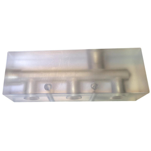 ProTool Metering Manifold Translucent 5 Port Softwash, a rectangular metal manifold with five ports for 1/2 inch and 3/4 inch connections, used in softwash systems.