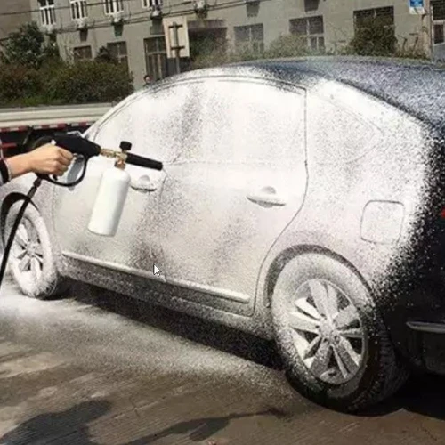 TRADEWRX ProTool Wash Sprayer 110V for Houses, Siding, Buildings, Decks, Fences, Autos, in use for washing a car with a spray of water covering the vehicle.