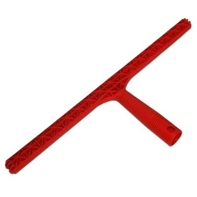 Pulex T-Bar Plastic Red, a red plastic cleaning tool with a T-shaped handle and a wide, perforated cleaning edge.