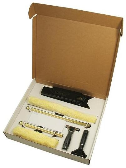 Ettore Congratulations Welcome Kit, image of a paint tool set including two paint rollers, a scraper, a black handheld tool, and a small black tool in a cardboard box.