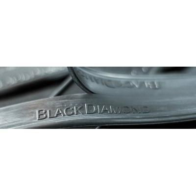 J.Racenstein Black Diamond Rubber, close-up of embossed brand name on black rubber material.