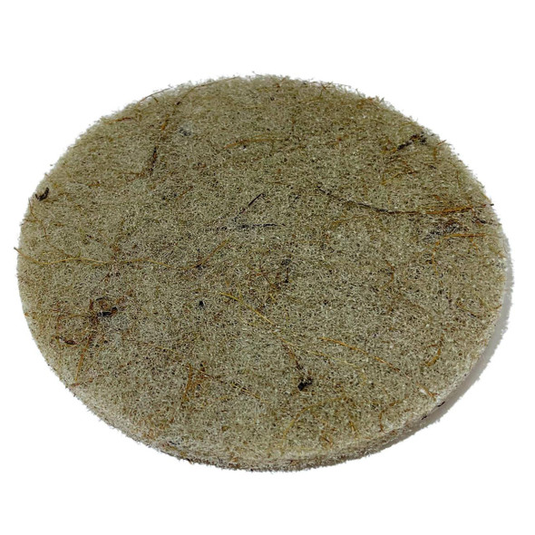 ProTool Coconut Shell Natural Fiber 5in Round Scrub Pad, close-up of a textured, biodegradable cleaning scrub pad made from coconut shell fibers with a rough surface for scrubbing.