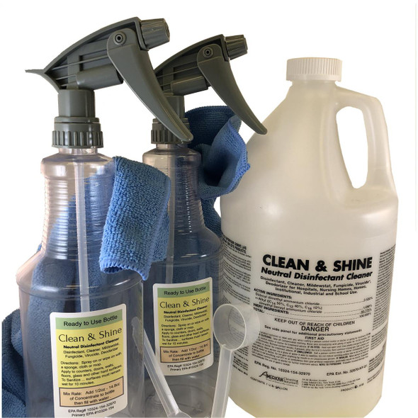 J.Racenstein Kit Clean & Shine Ready to Use, clear spray bottles with spray nozzles and blue cleaning towels.