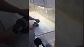 StonePro YouTube Granite Top Restoration Light, demonstrating the restoration process on a granite surface with specialized equipment.