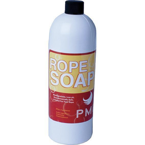 J.Racenstein Rope Soap PMI, a white plastic bottle with a black cap and a label that reads 'Rope Soap' in large letters, highlighting its biodegradable, low odor, environmentally safe qualities.