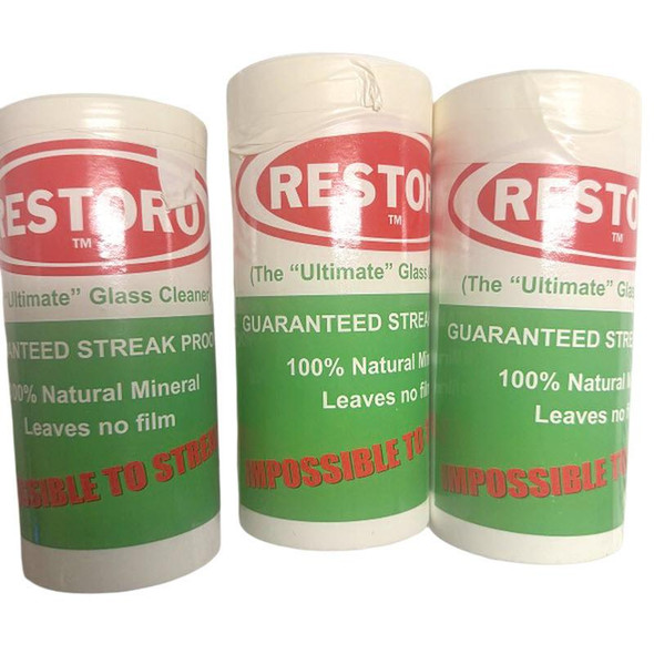Restoro 22oz, glass cleaner product bottles with green and red labeling with sponge design, marketed as the ultimate glass cleaner with natural mineral leaves no film and guaranteed streak-free results