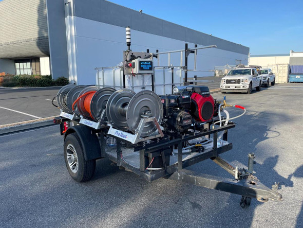 ProTool Small Dual User Pressure Washing Trailer 8gpm, a mobile pressure washing unit with hoses, water tanks, and powerful equipment on a trailer for commercial cleaning applications.