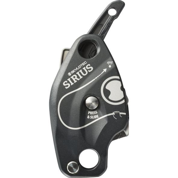 Skylotec Descender SIRIUS for 7/16in or 1/2in Rope, product image showing a compact, black and gray descent control device with instructions and branding on the surface.