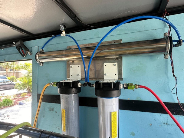 ProTool HydroPanel Mini RODI Wall Mount, wall-mounted water filtration system with two black and silver filtration units and blue and red tubing.