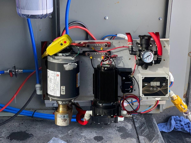 ProTool Wall Mount 20in 110V Boost - 12V Delivery, a technical equipment setup with various components, wires, and gauges.