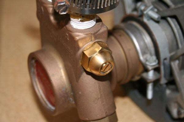 Leeson Pump Motor 1/2hp for Vane Pump, close-up view of the bronze-colored motor and metallic fittings.
