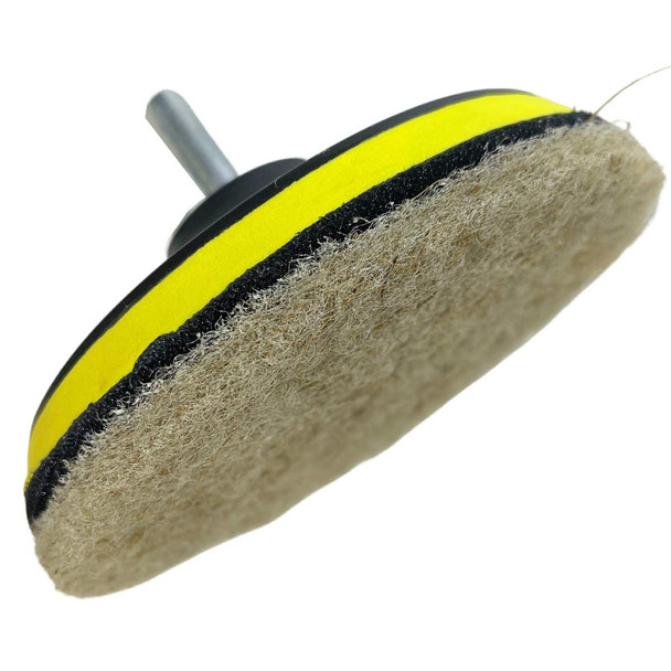 ProTool Coconut Shell Natural Fiber 5in Round Scrub Pad, close-up of a biodegradable scrub pad with natural fiber surface and yellow and black striping.