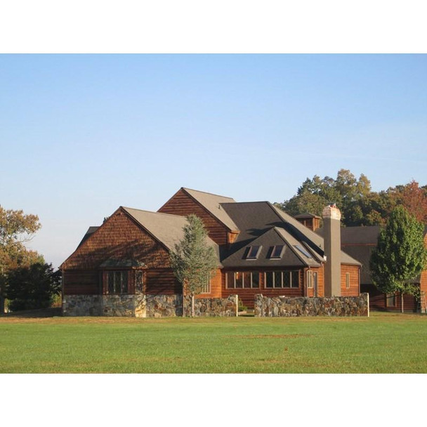 J.Racenstein Seneca Brown Deck & Wood Stain DRP, applied to a wooden house exterior, highlighting its rich brown wood finish and protection for decks and wood surfaces.