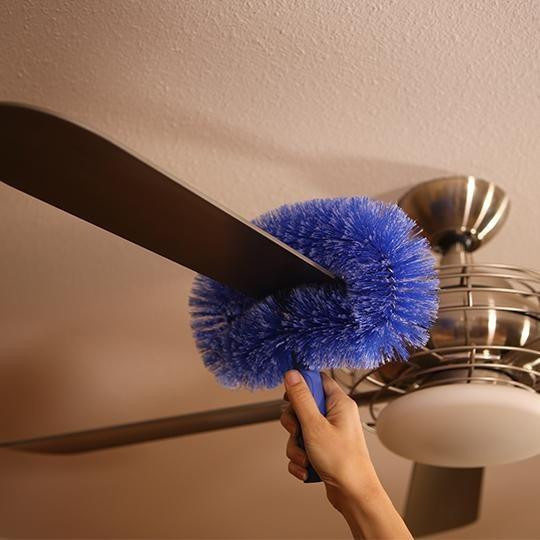 Ettore Brush Ceiling Fan, cleaning brush attached to ceiling fan blade using a hand