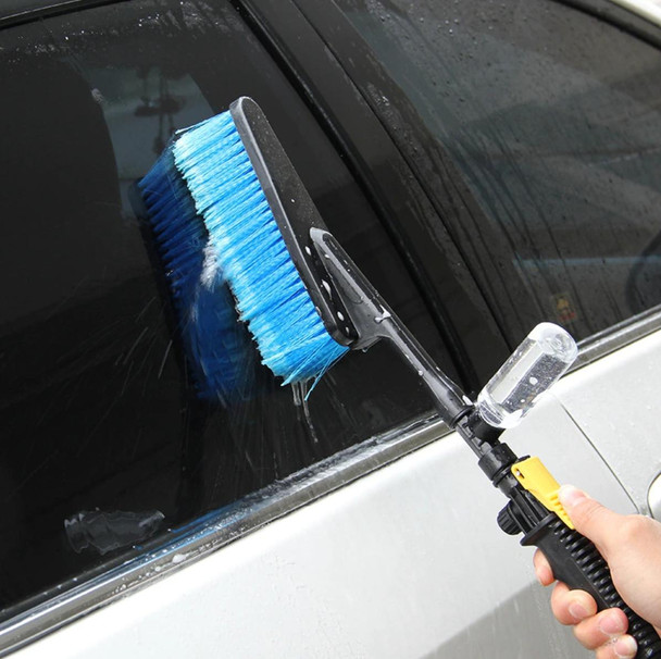 ProTool Water Cleaning Brush, handheld water pressure brush being used to clean a car window with water spray.