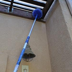 Ettore Brush Cobweb with click lock feature, extending cleaning tool reaching high corners to remove cobwebs.