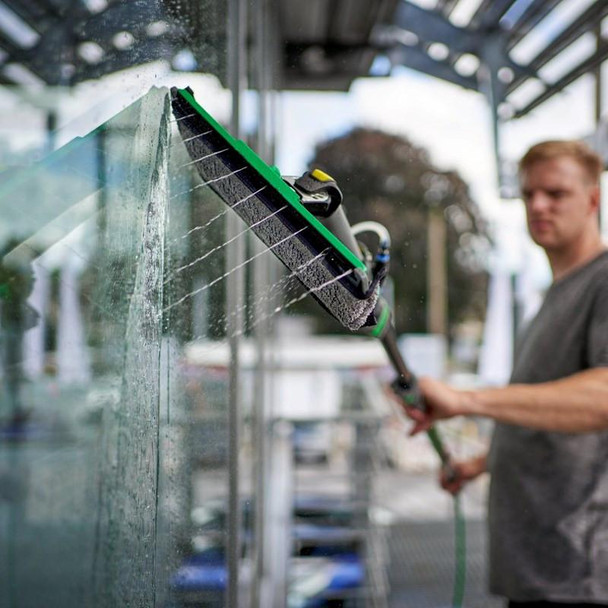 Unger nLite PowerPads, window cleaning tool with a large microfiber pad attached to a squeegee for efficient glass cleaning.