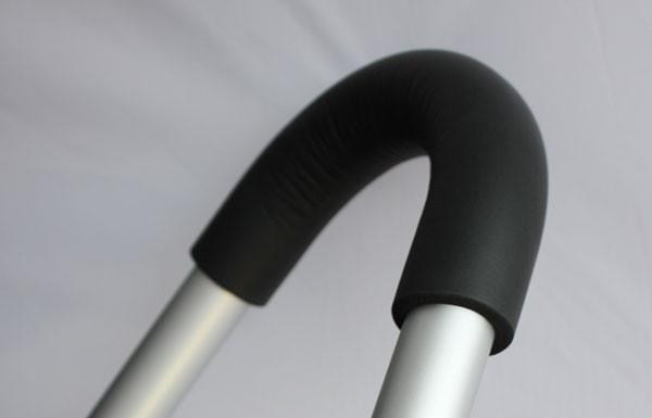 J.Racenstein Foam replacement elbow pads for Ladder Stand Out - Pair, close-up of black foam padded elbow guard on a ladder with a gray background.