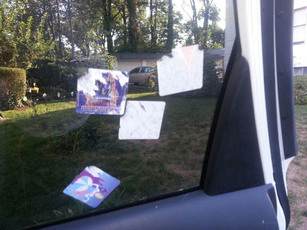 ProTool Solv-It Wipes (50), package of cleaning wipes attached to a car window for cleaning purposes.